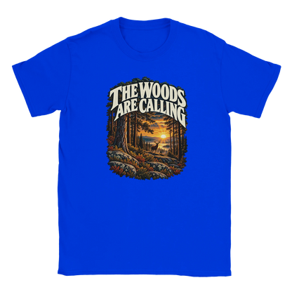 The Woods Are Calling - T-shirt in Royal. A deer between tall pine trees in golden light beneath The Woods Are Calling lettering.