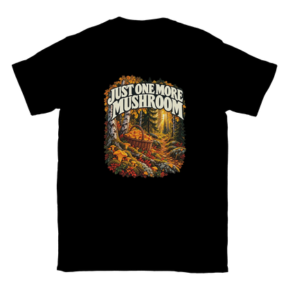 Just One More Mushroom - T-shirt in Black. Golden mushrooms in a wicker basket on a mossy forest floor beneath Just One More Mushroom lettering.