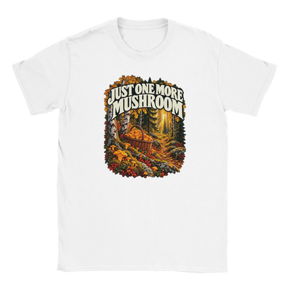 Just One More Mushroom - T-shirt in White. Golden mushrooms in a wicker basket on a mossy forest floor beneath Just One More Mushroom lettering.
