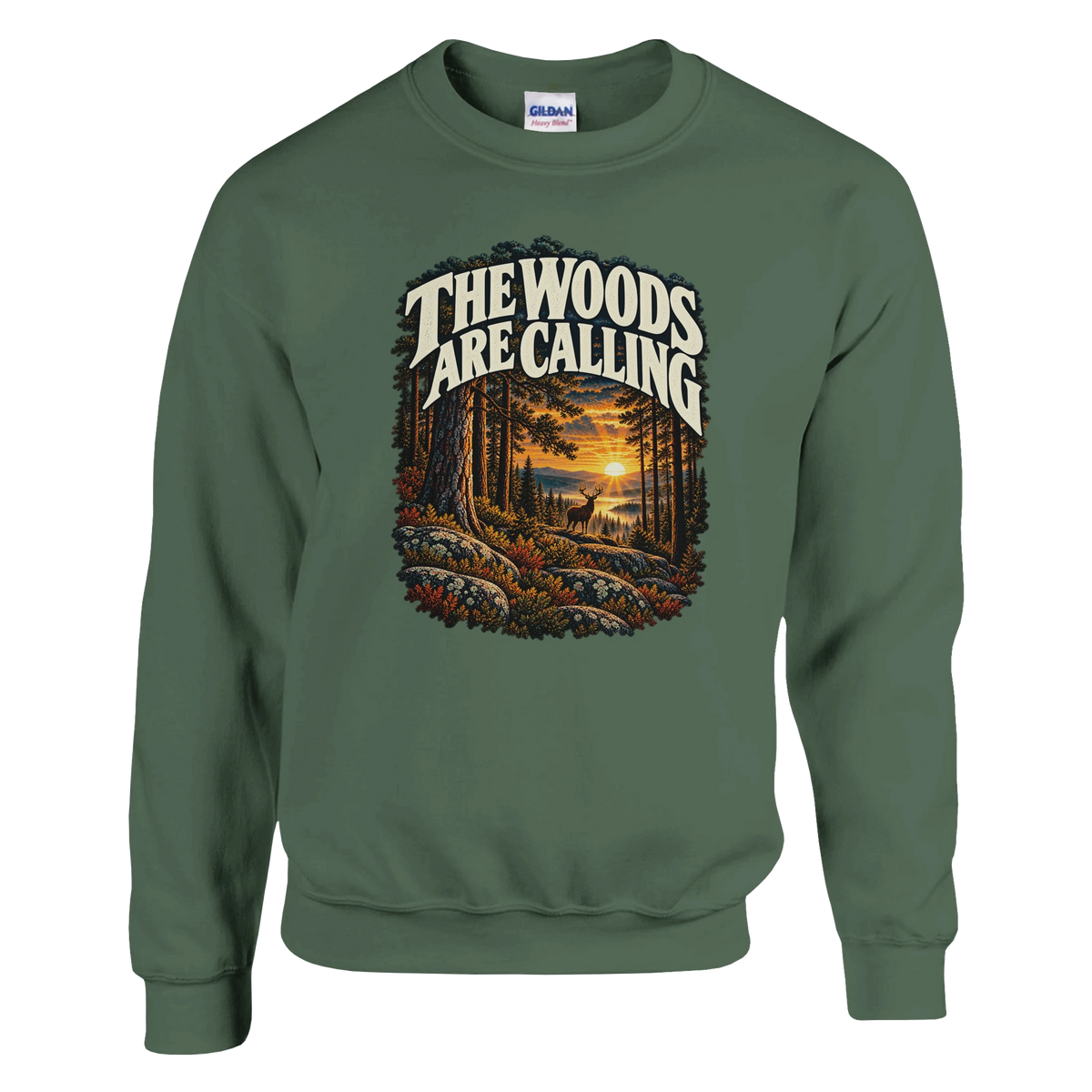 The Woods Are Calling - Sweatshirt in Military Green. A deer between tall pine trees in golden light beneath The Woods Are Calling lettering.