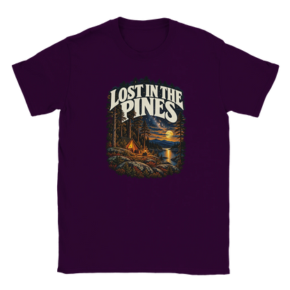 Lost In The Pines - T-shirt in Maroon. A tent among tall pines beside a moonlit lake and starry sky beneath Lost in the Pines lettering.