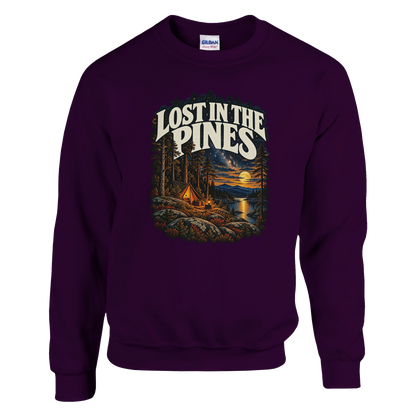 Lost In The Pines - Sweatshirt in Maroon. A tent among tall pines beside a moonlit lake and starry sky beneath Lost in the Pines lettering.