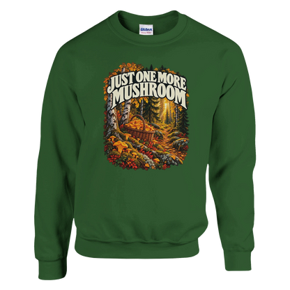 Just One More Mushroom - Sweatshirt in Military Green. Golden mushrooms in a wicker basket on a mossy forest floor beneath Just One More Mushroom lettering.