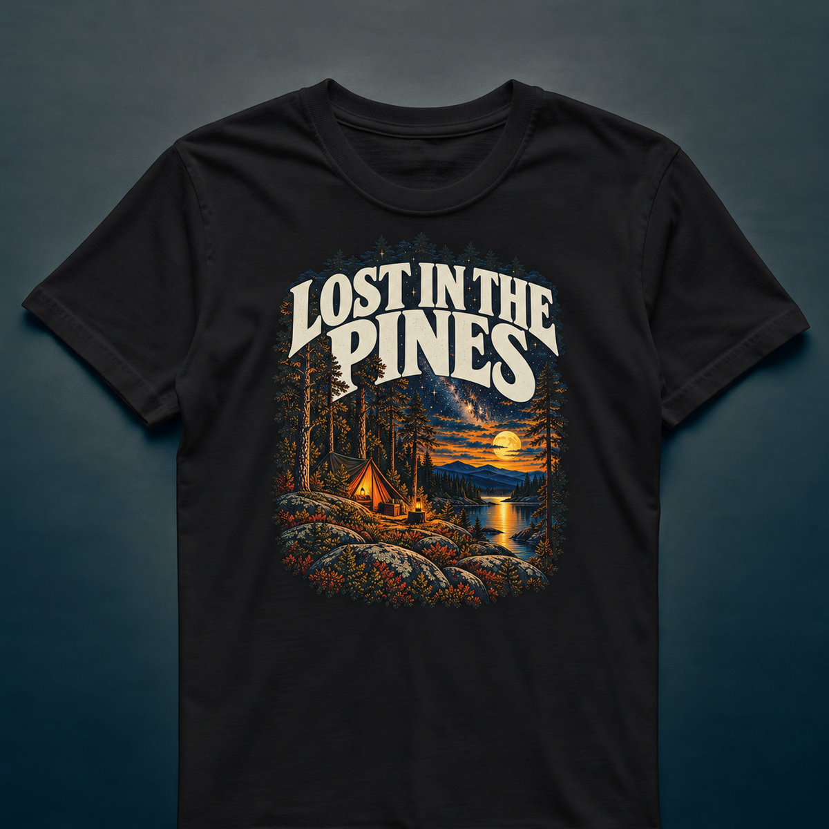 Lost In The Pines - T-shirt in black, photographed against the RBIF dark blue-grey studio background.