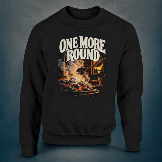 Black sweatshirt with the One More Round print: water hitting hot sauna stones, steam in a timber sauna and a lake sunset through the window